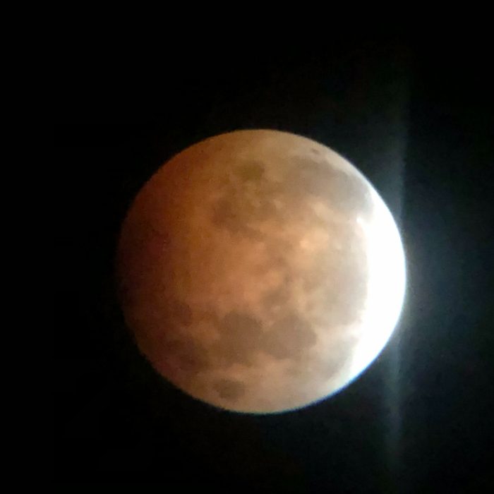 Name: Dean Clark Instagram: n/a  Camera: Iphone 8 Telescope: Dobsonian 10" GoTo  Subject: Blood Moon  Photo Taken: May 2021 Image Duration: n/a Software used: n/a  Filters used: n/a  Photo Information: Taken with a very steady hand, and the phone held up to the telescope eyepiece.