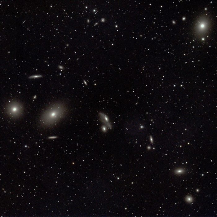 Name: Gerhard VelaitisInstagram: PrivateCamera: ZWO ASI1600MC with 0.8x reducer lensTelescope: Saxon ED80Subject: Markarians Chain is a cluster of galaxies approx 50 million light years distant in Virgo, that appears in an arc from our point of view. Photo Taken: 29th July 2020 Image Duration: Total exposure time for this image was just over 1 hour Software: Astro Photo Tool (APT), Pixinsight, Photoshop Filters used: UV / IR Cut (ultraviolet / infrared cut)  Photo Information: Some members of the cluster are gravitationally interacting. The elliptical galaxy M87 is also seen in the upper RH corner. This galaxy contains the super-massive black hole that was successfully imaged early in 2021, via international collaboration using the Event Horizon Telescope.